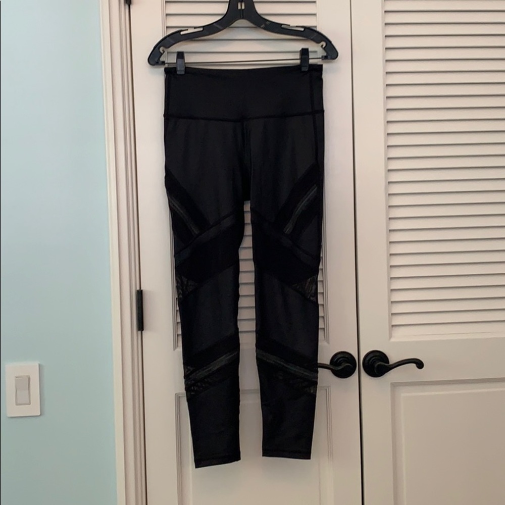 Black legging with sheer and reflective details